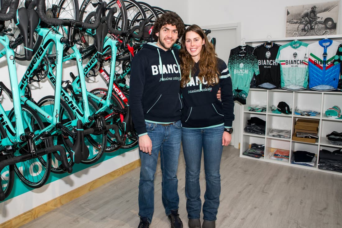 Couple in Bianchi Apparel with Bikes