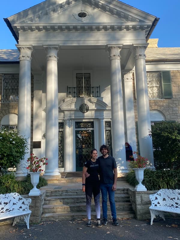 Cyclists outside of Graceland Mansion