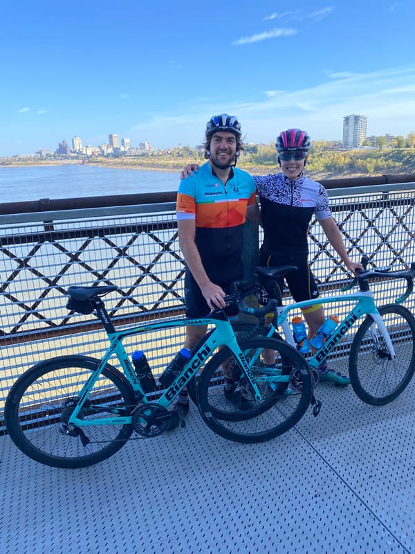 Cyclists on bridge between Tennessee and Arkansas