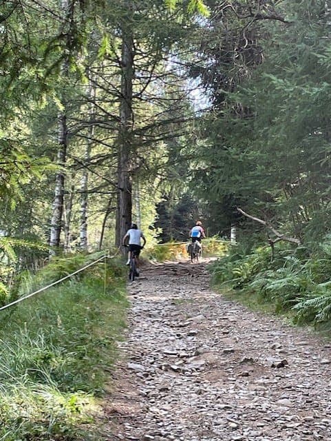 Cyclists on a Rocky Trail